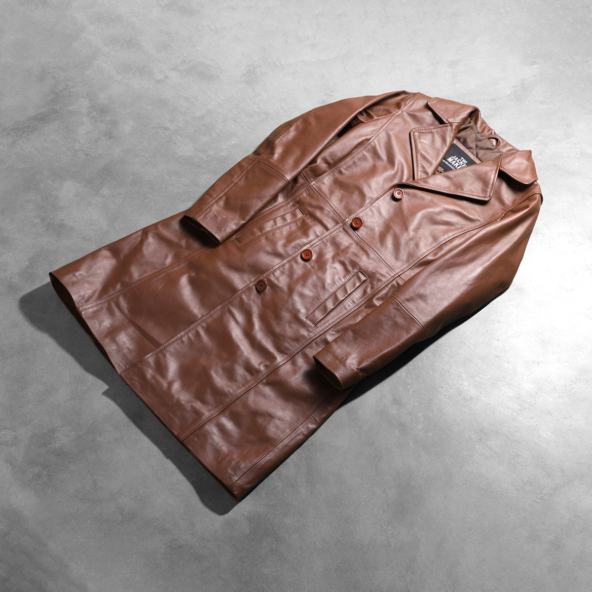 
Open Hem & Hem Craftsmanship Construction Detail on Women's Alexis Brown Single Breasted Leather Coat