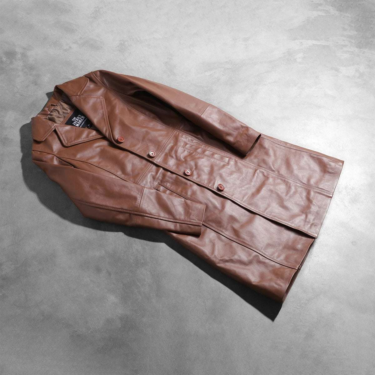 
Styled Fit Perspective of Women's Alexis Brown Single Breasted Leather Coat on Model - Natural Daylight Drape