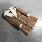 Open Hem &amp; Hem Craftsmanship Construction Detail on Women's Amie Distressed Brown Double Breasted Shearling Coat