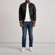 Close-Up Detail of Varsity & Button Hardware on Xander Black Varsity Jacket